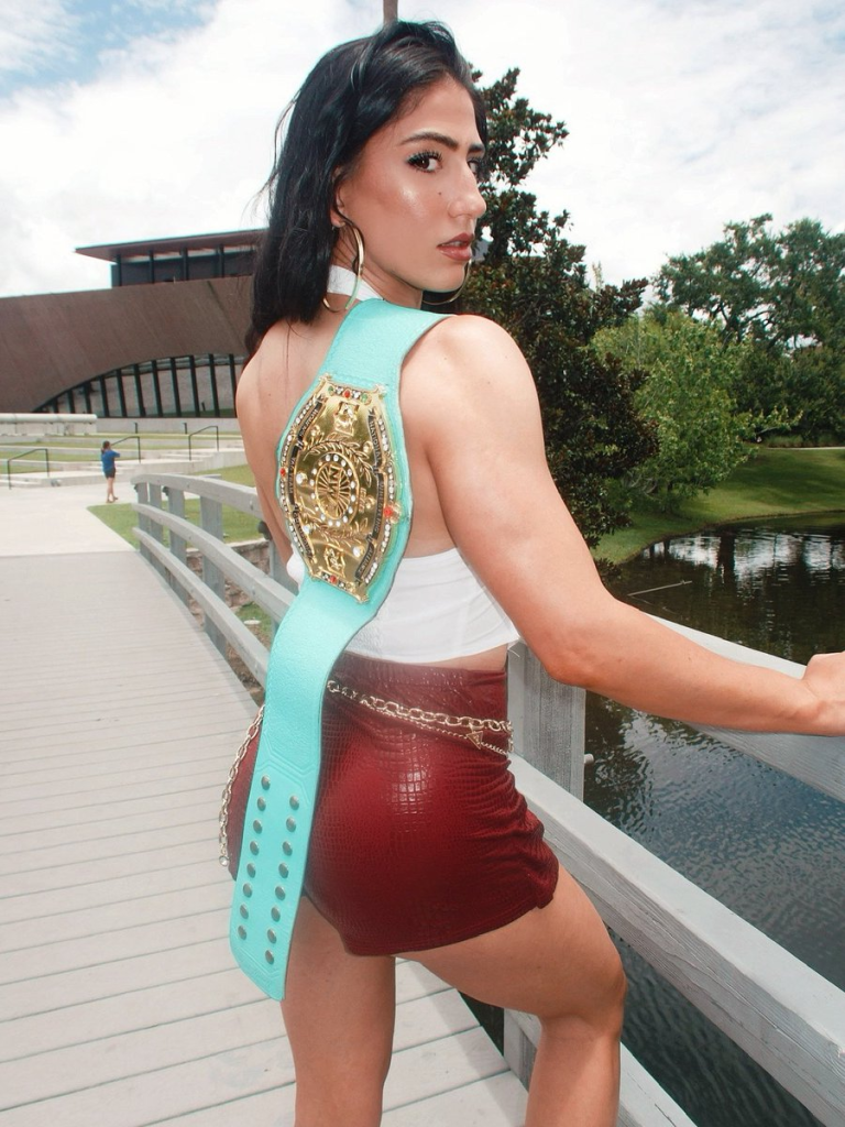 Valentina Rossi, out for a run with the NWA Title Belt in tow