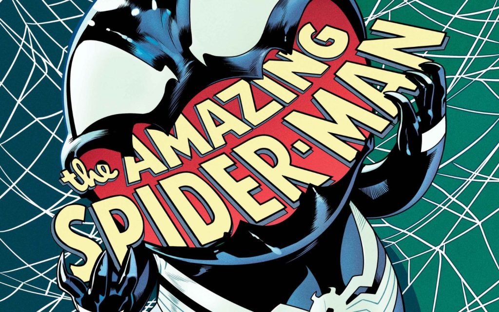 Symbie chomping on The Amazing Spider-Man logo